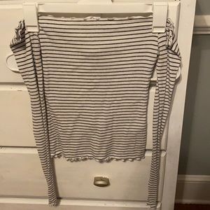 A cropped off the shoulder shirt